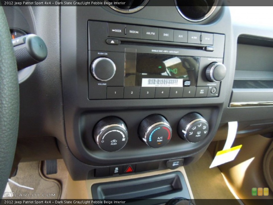 Dark Slate Gray/Light Pebble Beige Interior Controls for the 2012 Jeep Patriot Sport 4x4 #65494174