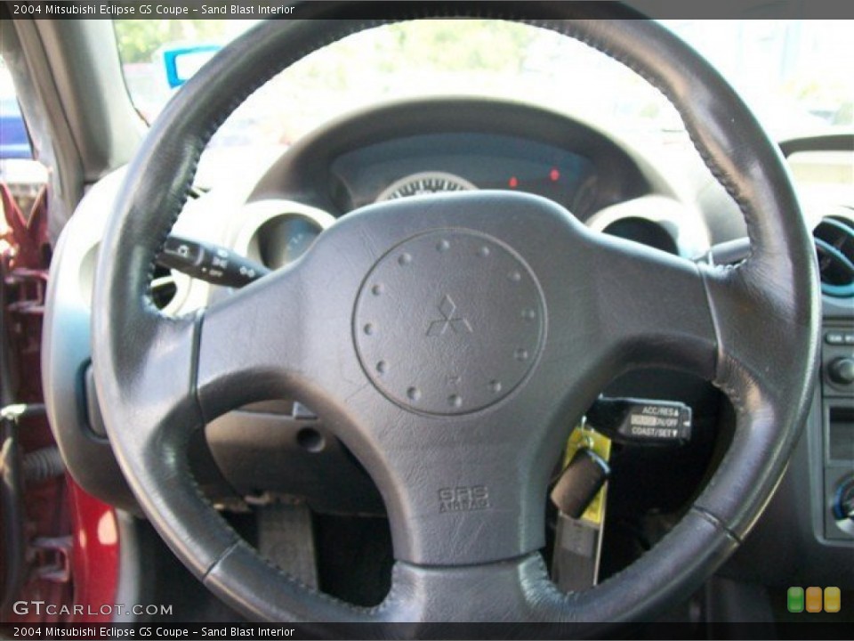 Sand Blast Interior Steering Wheel for the 2004 Mitsubishi Eclipse GS Coupe #65509454