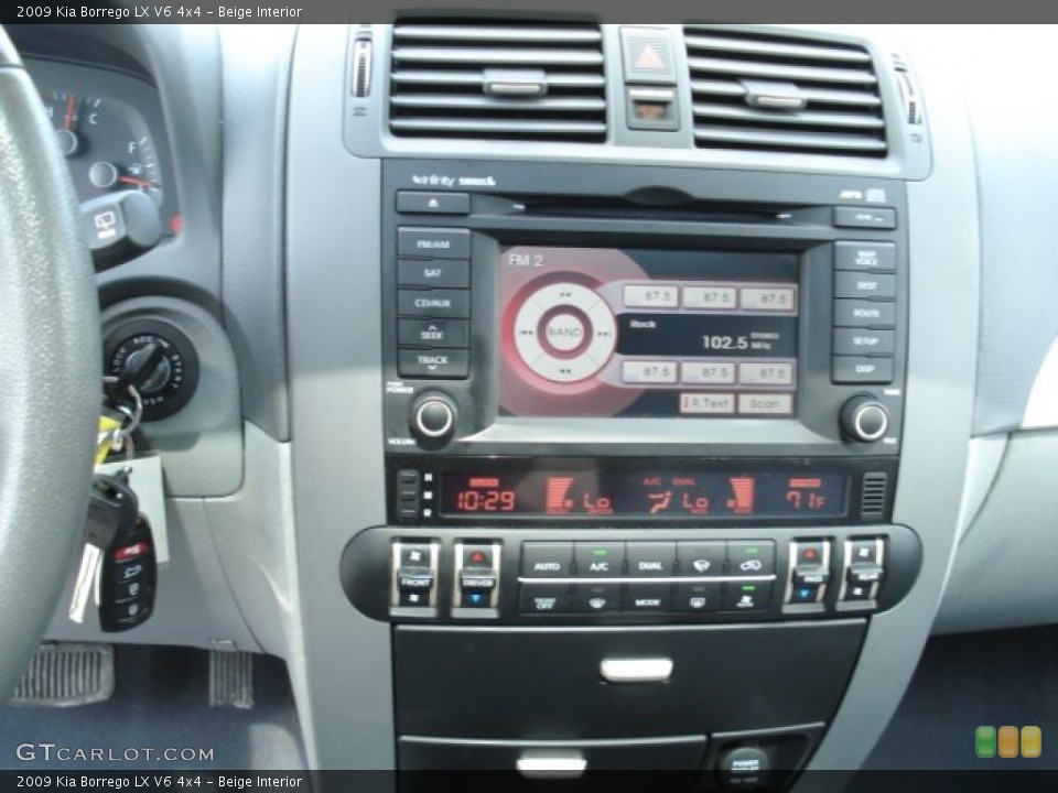 Beige Interior Controls for the 2009 Kia Borrego LX V6 4x4 #65516099