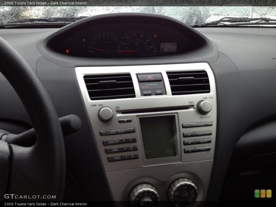 Dark Charcoal Interior Controls for the 2009 Toyota Yaris Sedan #65527649