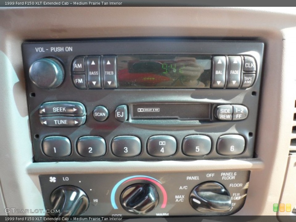 Medium Prairie Tan Interior Audio System for the 1999 Ford F150 XLT Extended Cab #65533782