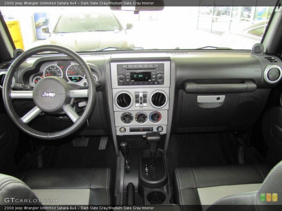 Dark Slate Gray/Medium Slate Gray Interior Dashboard for the 2009 Jeep Wrangler Unlimited Sahara 4x4 #65538258