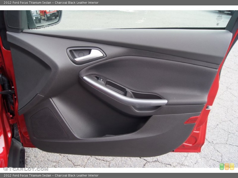 Charcoal Black Leather Interior Door Panel for the 2012 Ford Focus Titanium Sedan #65571485