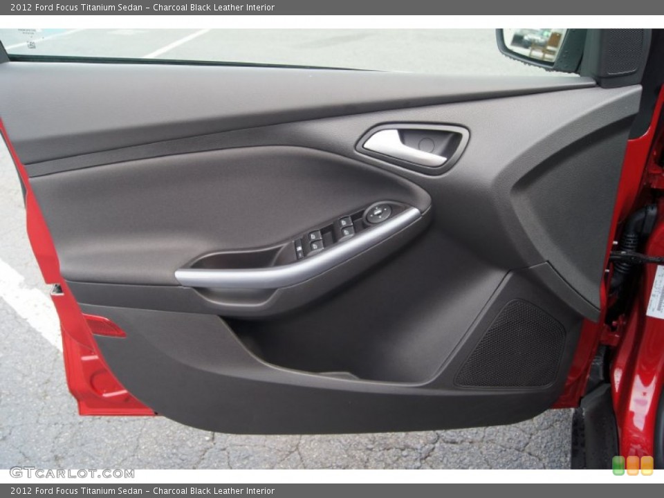 Charcoal Black Leather Interior Door Panel for the 2012 Ford Focus Titanium Sedan #65571527