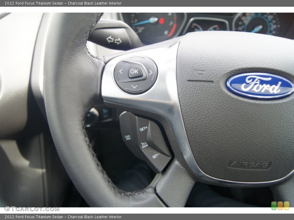 Charcoal Black Leather Interior Controls for the 2012 Ford Focus Titanium Sedan #65571563