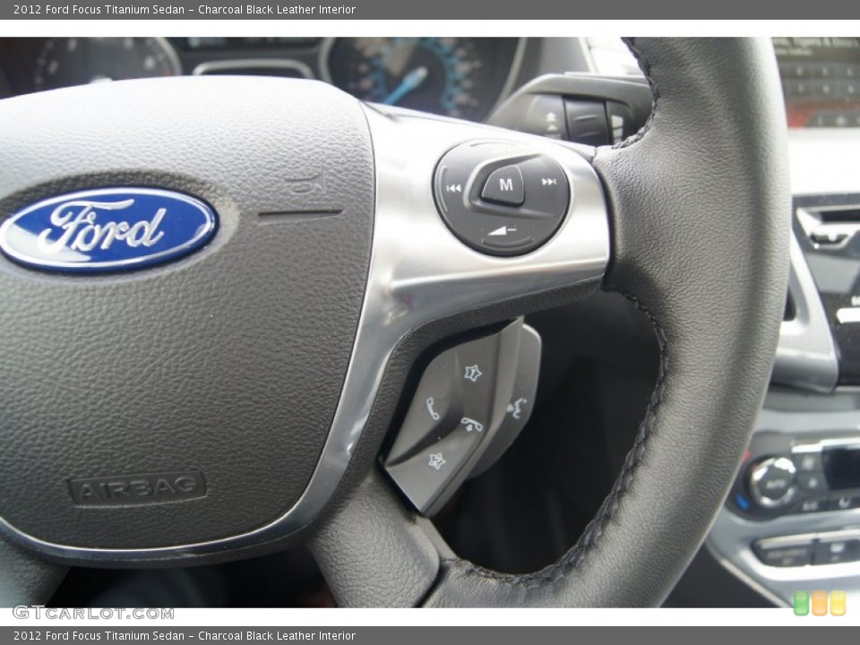 Charcoal Black Leather Interior Controls for the 2012 Ford Focus Titanium Sedan #65571572