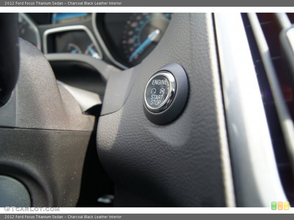 Charcoal Black Leather Interior Controls for the 2012 Ford Focus Titanium Sedan #65571581