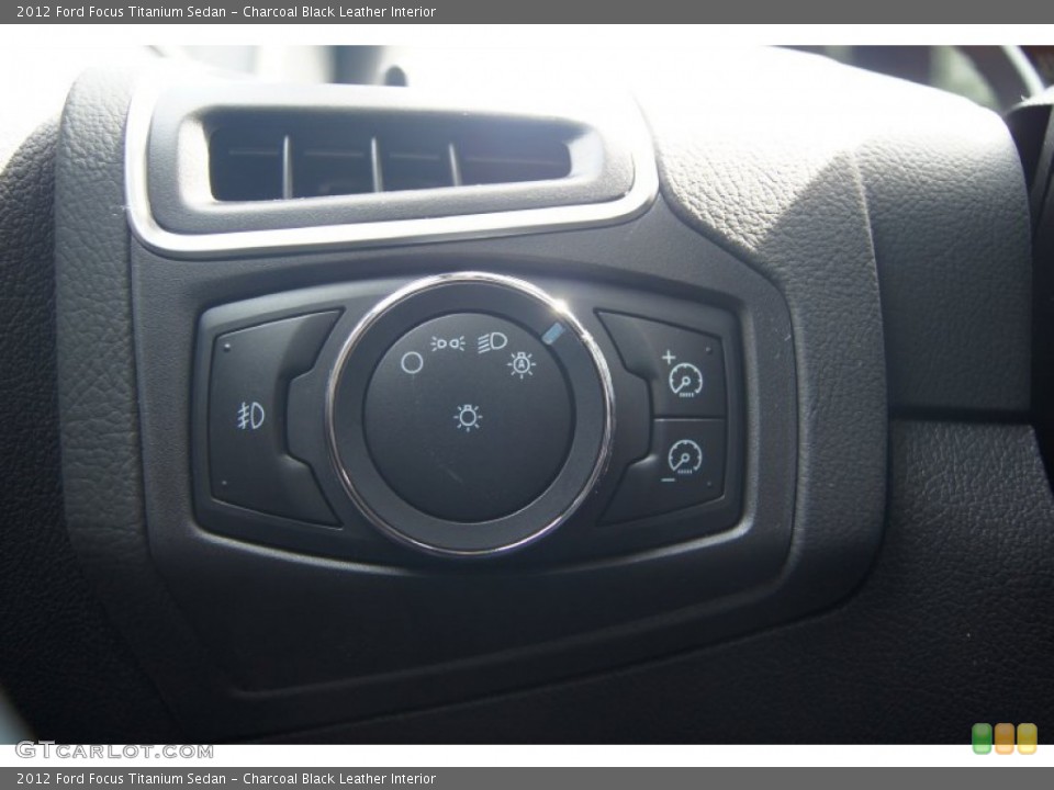 Charcoal Black Leather Interior Controls for the 2012 Ford Focus Titanium Sedan #65571647