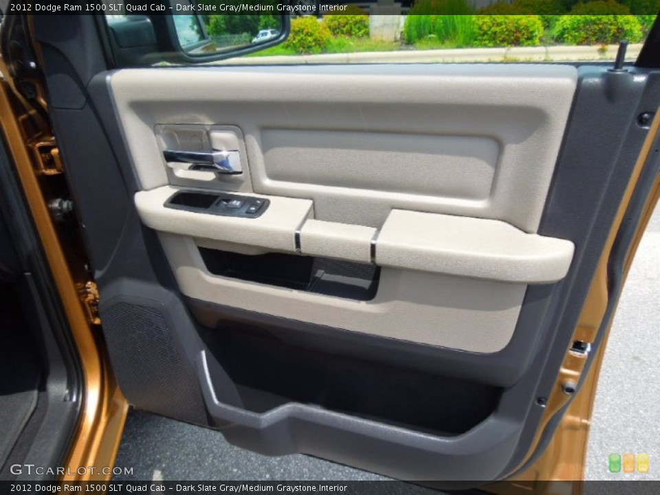 Dark Slate Gray/Medium Graystone Interior Door Panel for the 2012 Dodge Ram 1500 SLT Quad Cab #65594408