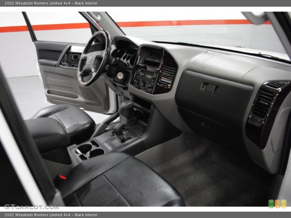 Black Interior Dashboard for the 2002 Mitsubishi Montero Limited 4x4 #65609137