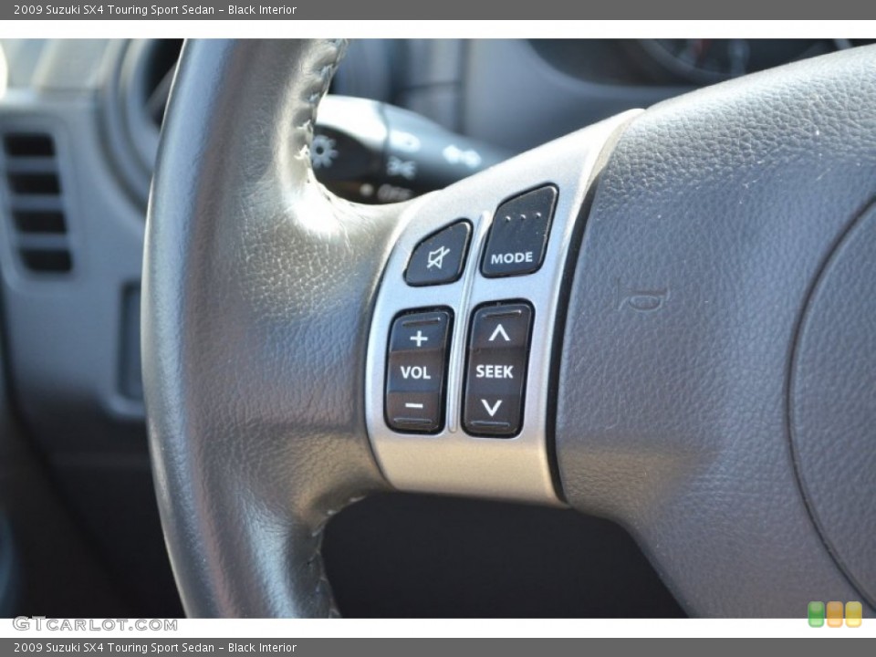 Black Interior Controls for the 2009 Suzuki SX4 Touring Sport Sedan #65618151