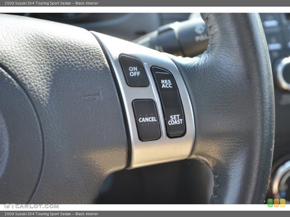 Black Interior Controls for the 2009 Suzuki SX4 Touring Sport Sedan #65618161
