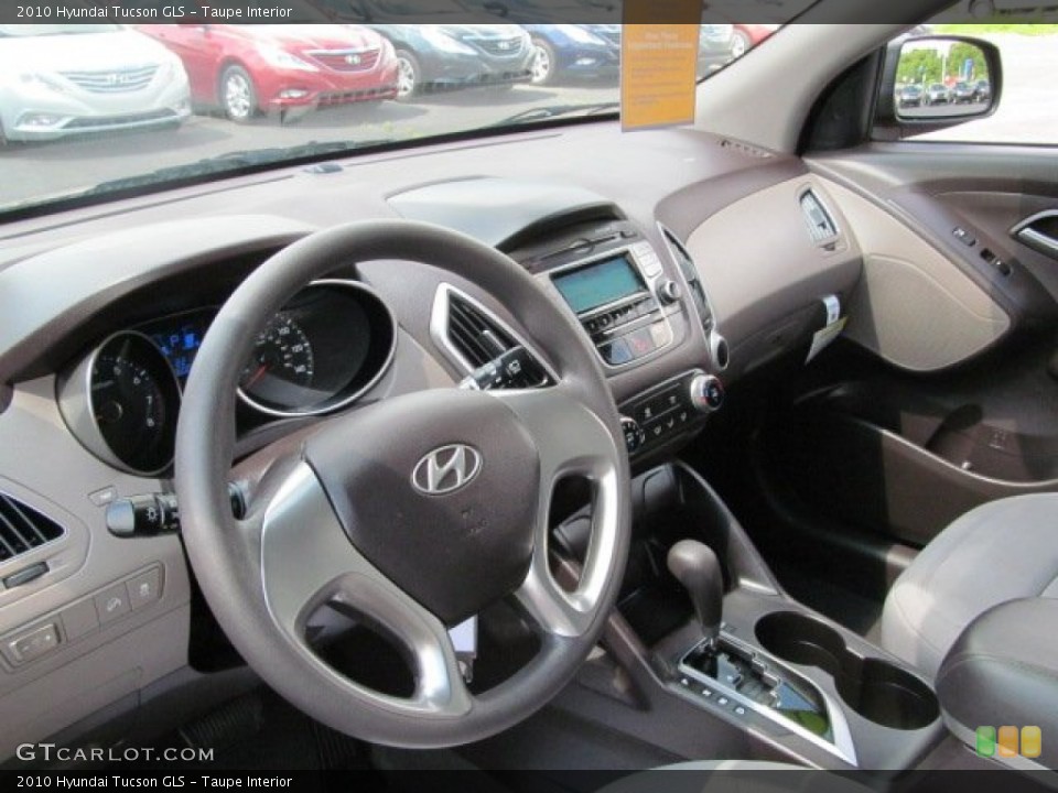 Taupe Interior Dashboard for the 2010 Hyundai Tucson GLS #65657512