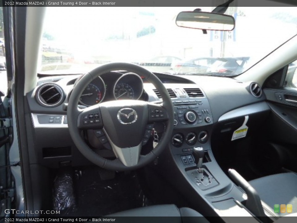 Black Interior Dashboard for the 2012 Mazda MAZDA3 i Grand Touring 4 Door #65684871