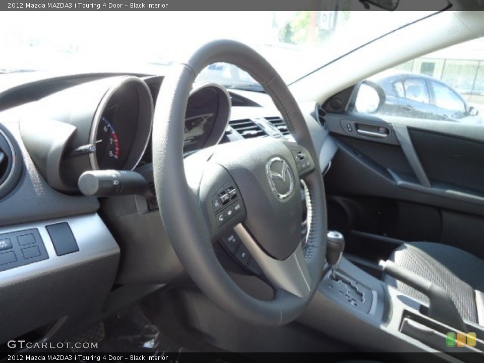 Black Interior Steering Wheel for the 2012 Mazda MAZDA3 i Touring 4 Door #65685465