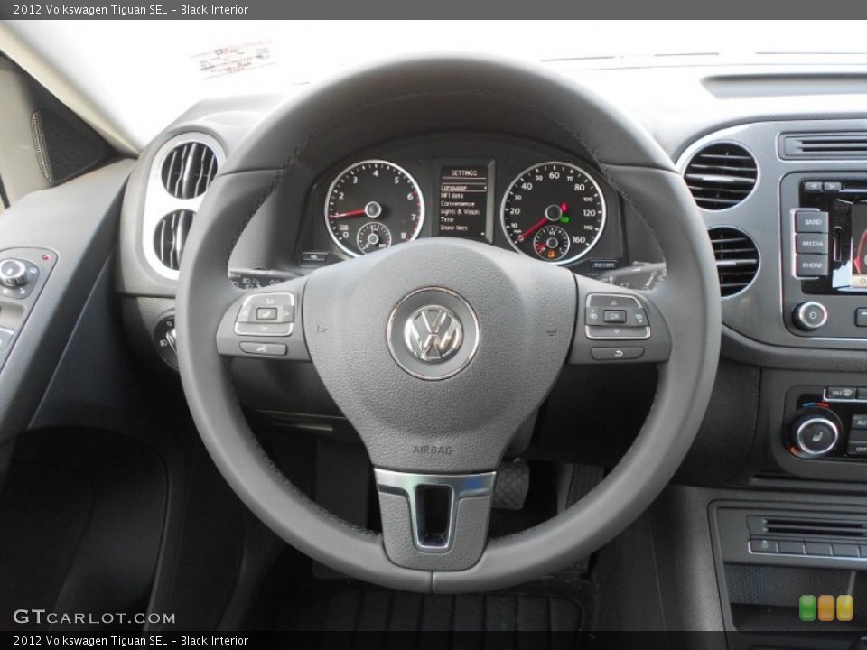 Black Interior Steering Wheel for the 2012 Volkswagen Tiguan SEL #65706596