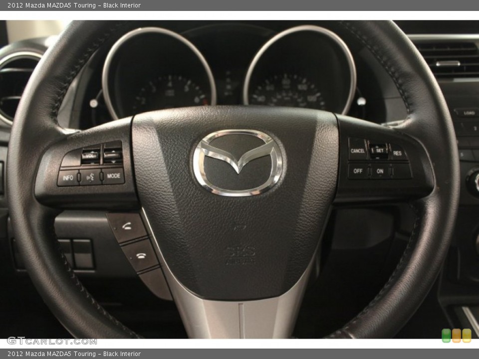 Black Interior Steering Wheel for the 2012 Mazda MAZDA5 Touring #65718566
