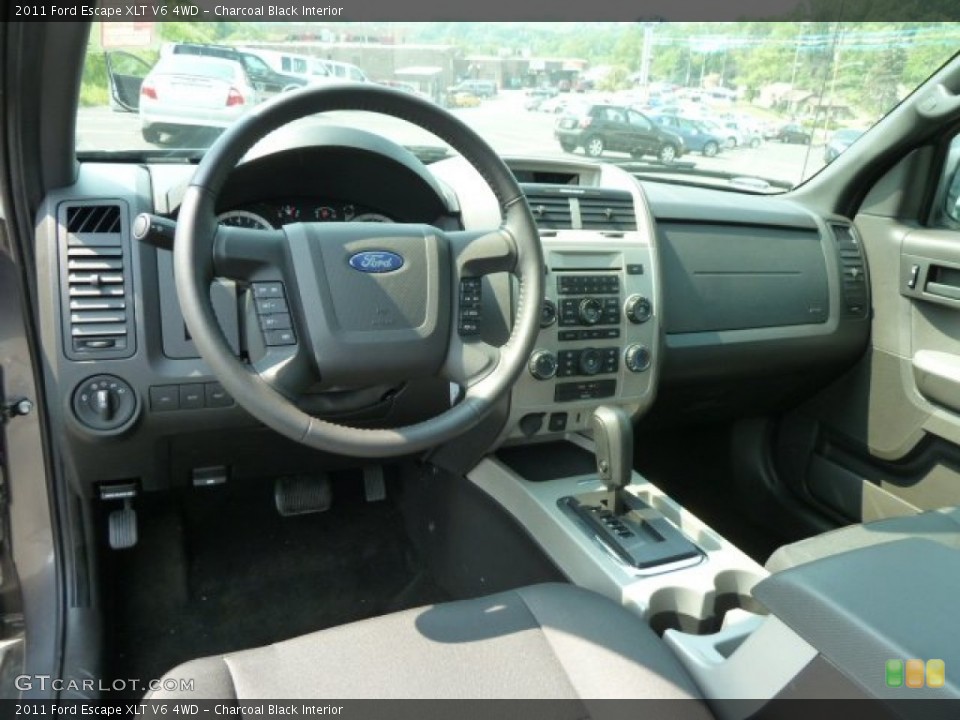 Charcoal Black Interior Dashboard for the 2011 Ford Escape XLT V6 4WD #65741371