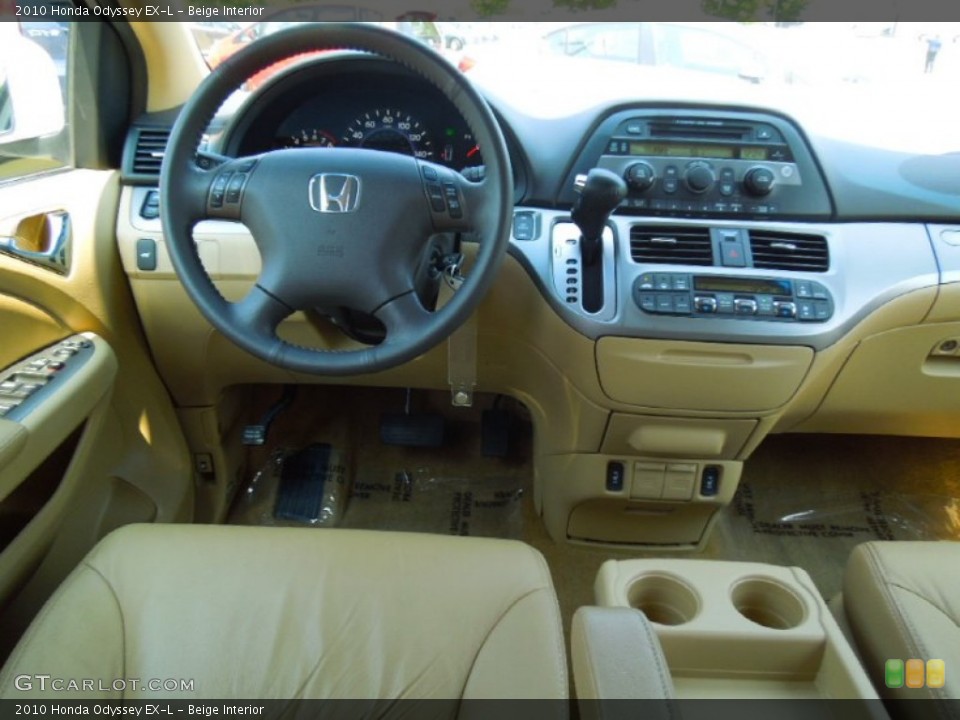 Beige Interior Dashboard for the 2010 Honda Odyssey EX-L #65759050