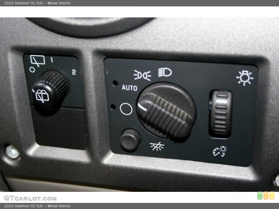 Wheat Interior Controls for the 2003 Hummer H2 SUV #65771638