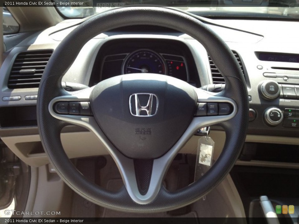 Beige Interior Steering Wheel for the 2011 Honda Civic EX Sedan #65786192
