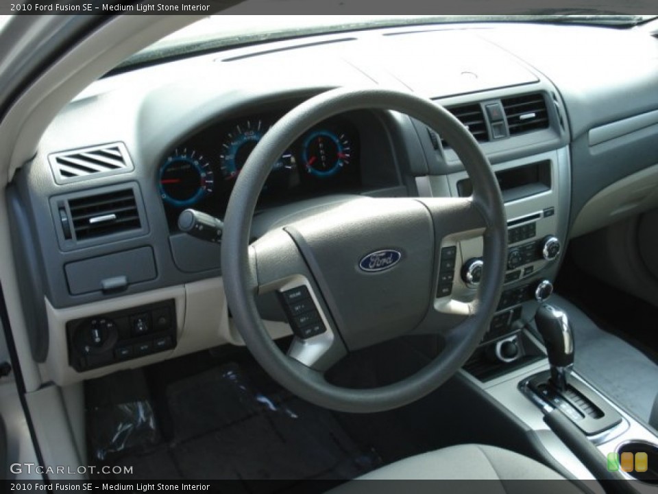 Medium Light Stone Interior Steering Wheel for the 2010 Ford Fusion SE #65791619