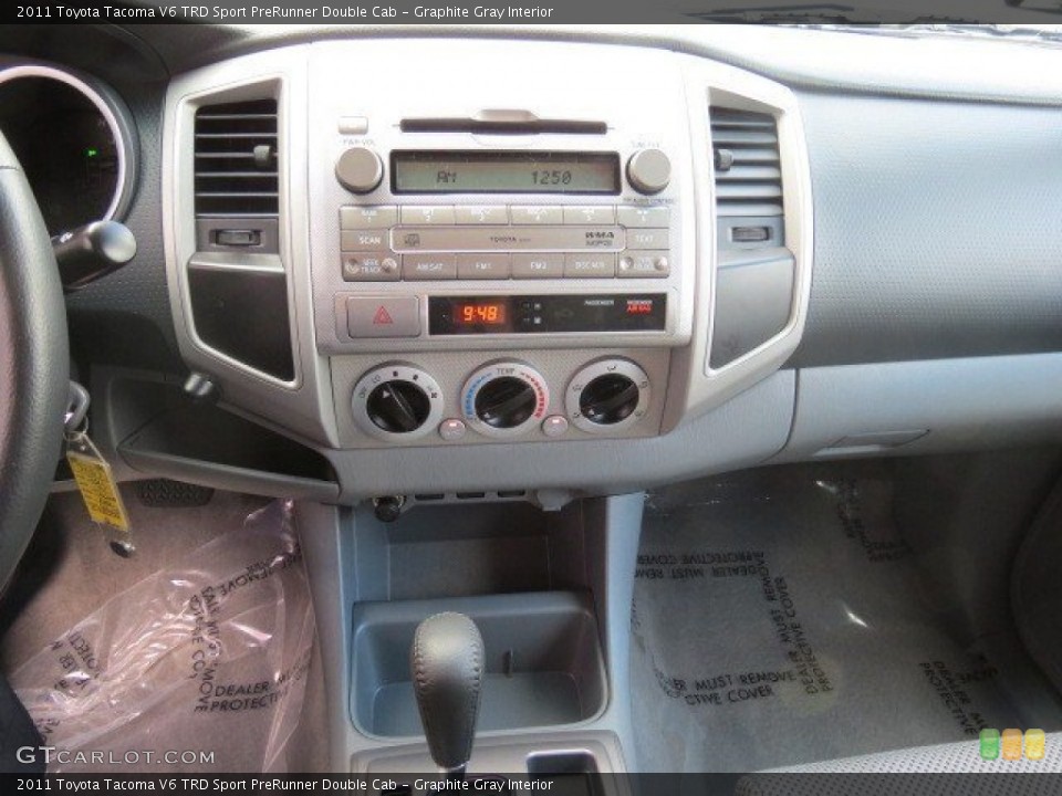 Graphite Gray Interior Controls for the 2011 Toyota Tacoma V6 TRD Sport PreRunner Double Cab #65859324