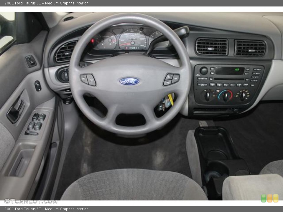 Medium Graphite Interior Dashboard for the 2001 Ford Taurus SE #65884697