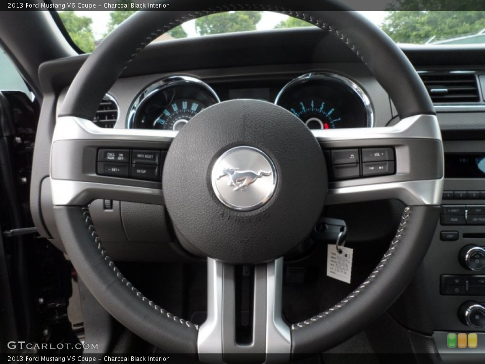 Charcoal Black Interior Steering Wheel for the 2013 Ford Mustang V6 Coupe #65901240