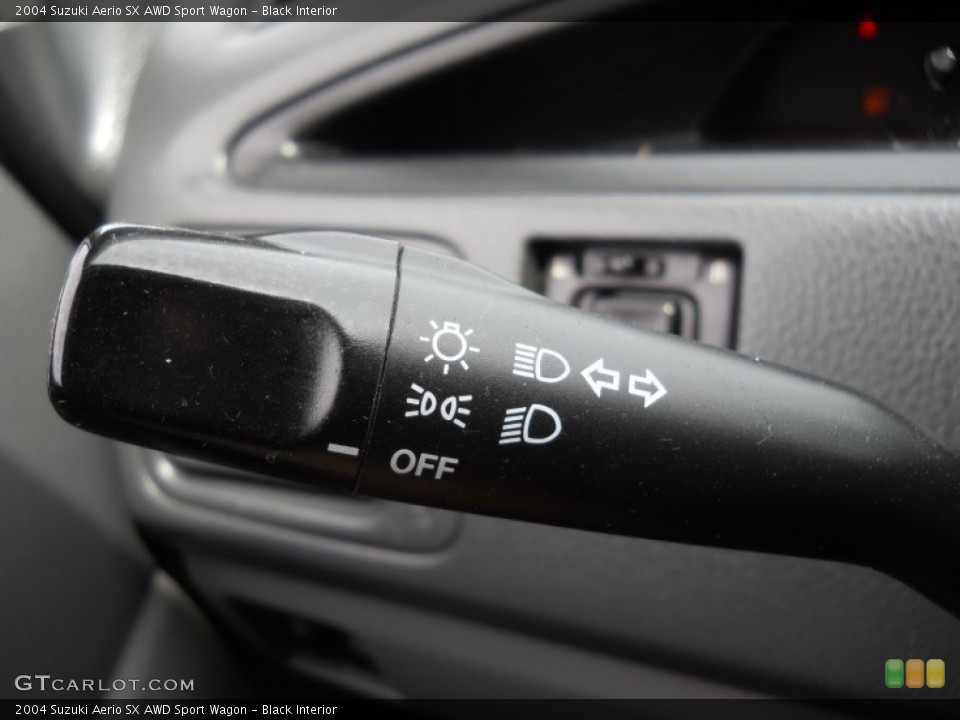 Black Interior Controls for the 2004 Suzuki Aerio SX AWD Sport Wagon #65906664