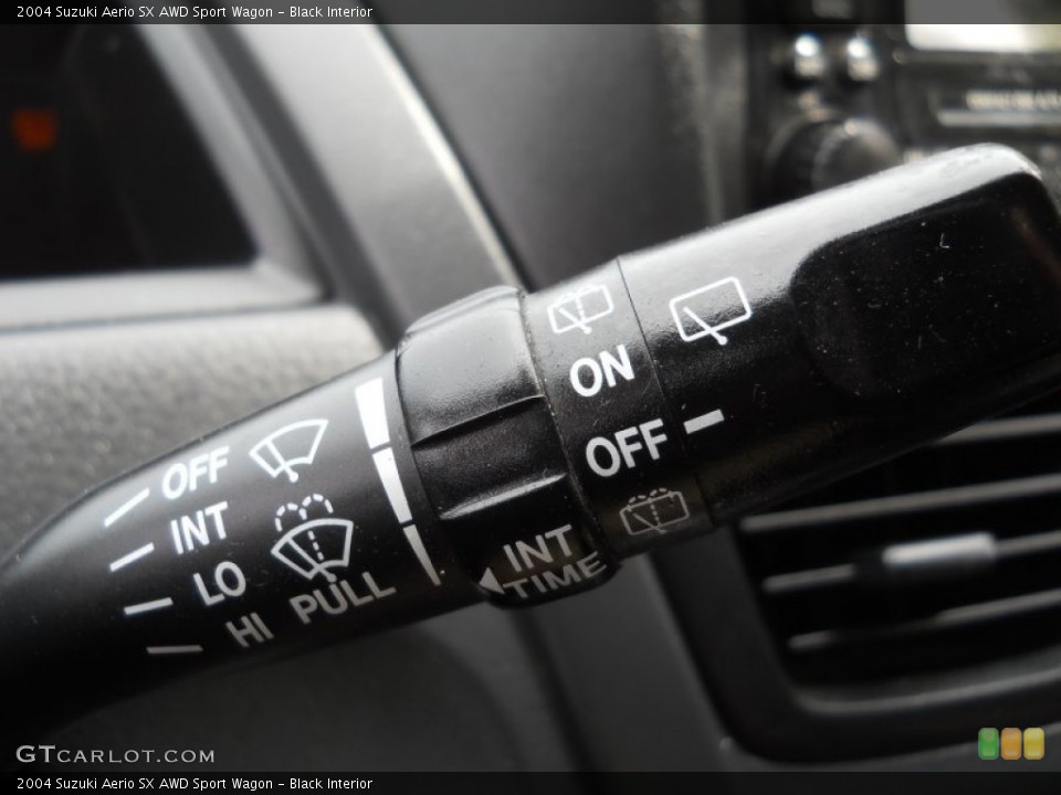Black Interior Controls for the 2004 Suzuki Aerio SX AWD Sport Wagon #65906697