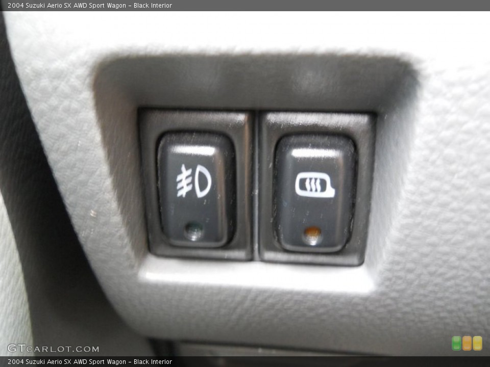 Black Interior Controls for the 2004 Suzuki Aerio SX AWD Sport Wagon #65906739