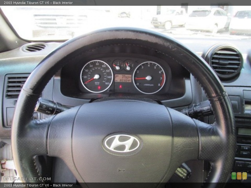 Black Interior Steering Wheel for the 2003 Hyundai Tiburon GT V6 #65925752