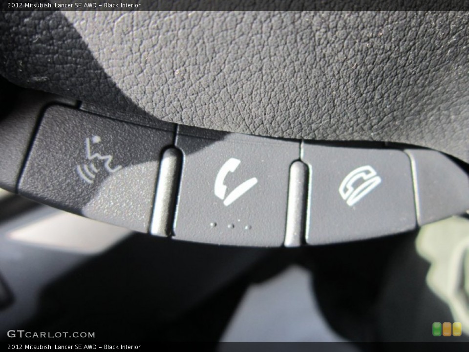 Black Interior Controls for the 2012 Mitsubishi Lancer SE AWD #65931953