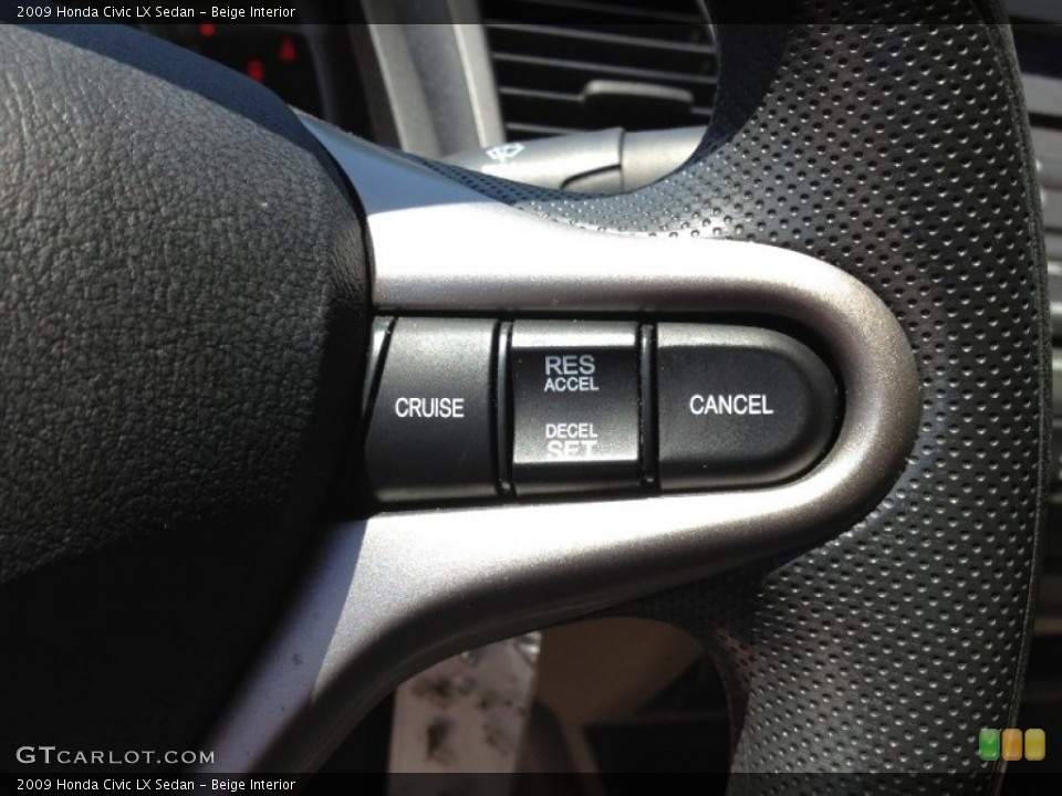Beige Interior Controls for the 2009 Honda Civic LX Sedan #65939273