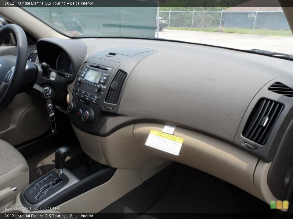 Beige Interior Dashboard for the 2012 Hyundai Elantra GLS Touring #65963234