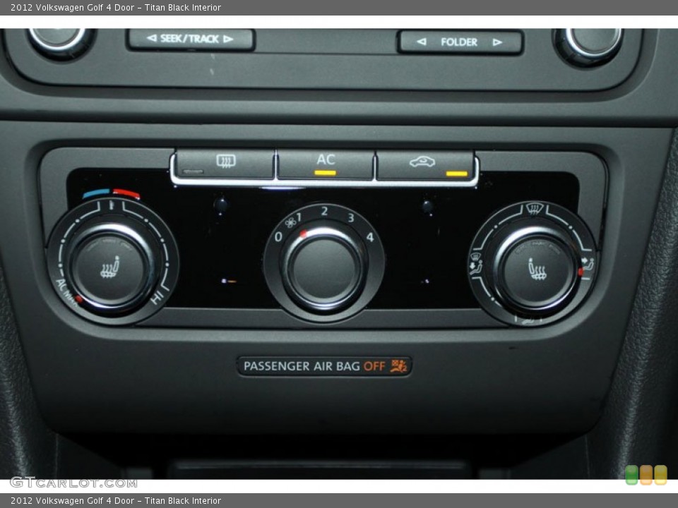 Titan Black Interior Controls for the 2012 Volkswagen Golf 4 Door #65984658