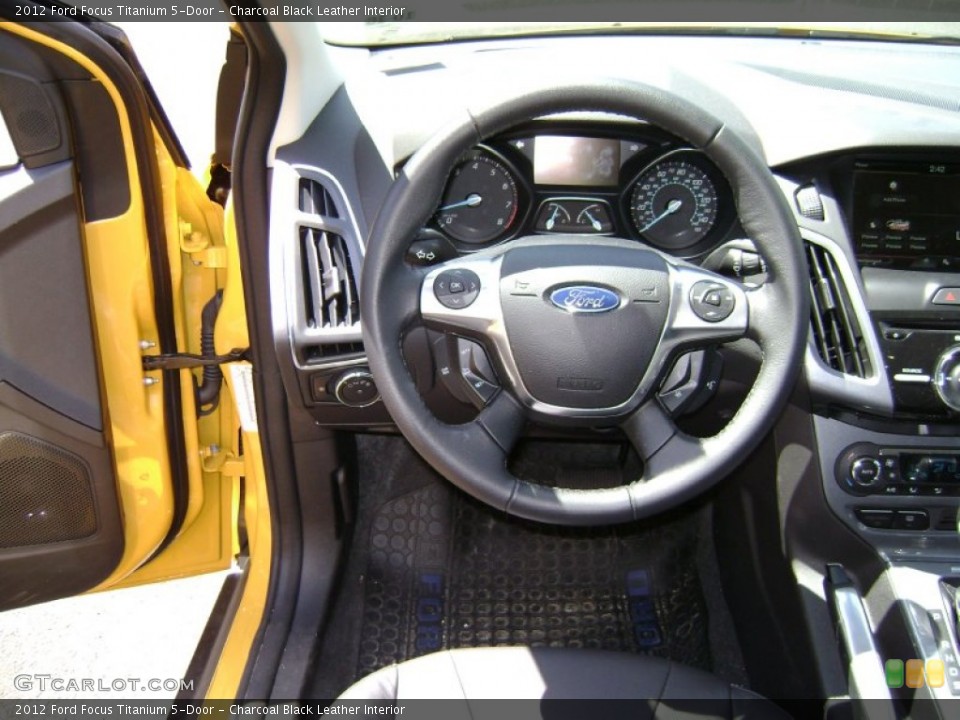 Charcoal Black Leather Interior Steering Wheel for the 2012 Ford Focus Titanium 5-Door #66000141