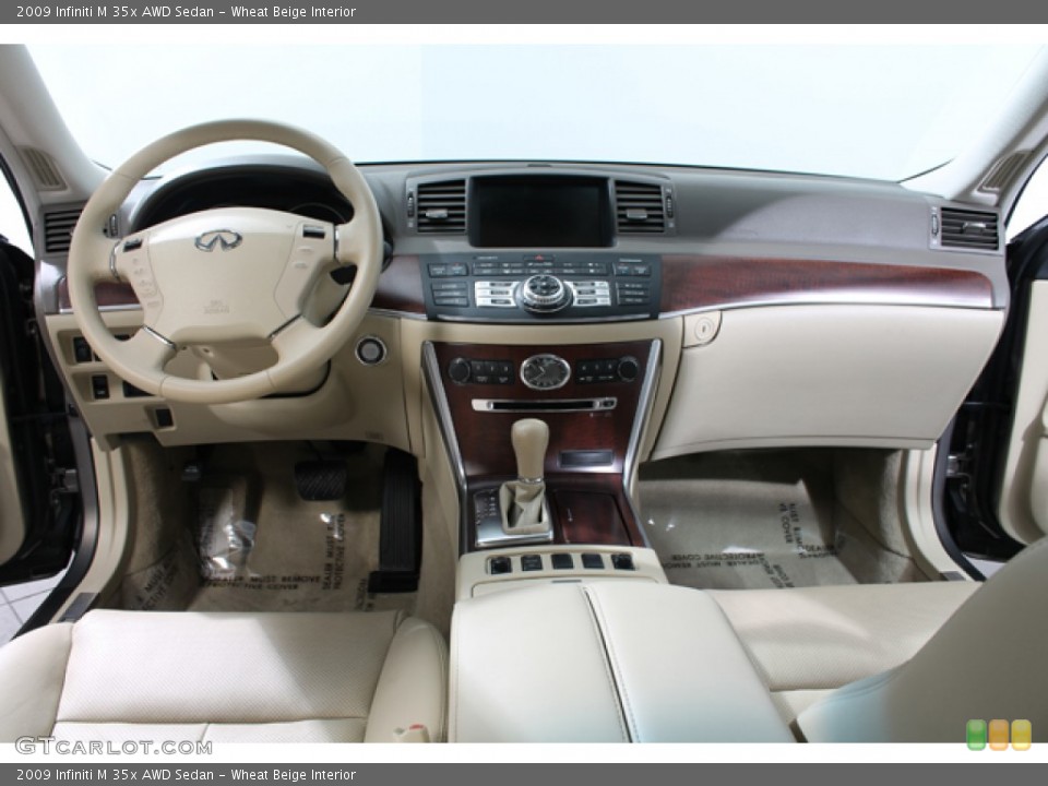 Wheat Beige Interior Dashboard for the 2009 Infiniti M 35x AWD Sedan #66006912