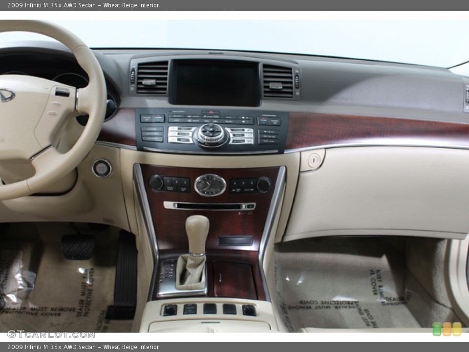 Wheat Beige Interior Dashboard for the 2009 Infiniti M 35x AWD Sedan #66006939