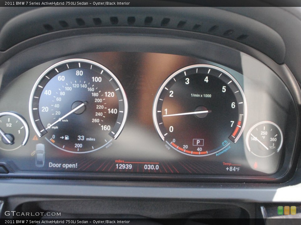 Oyster/Black Interior Gauges for the 2011 BMW 7 Series ActiveHybrid 750Li Sedan #66060422