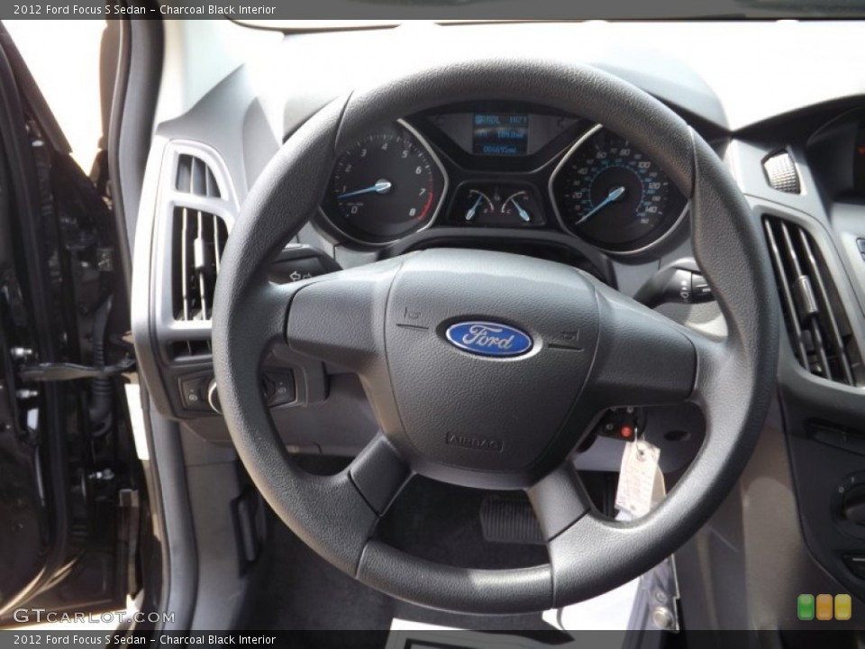 Charcoal Black Interior Steering Wheel for the 2012 Ford Focus S Sedan #66090639