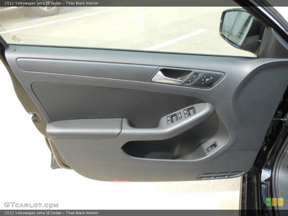 Titan Black Interior Door Panel for the 2012 Volkswagen Jetta SE Sedan #66093750