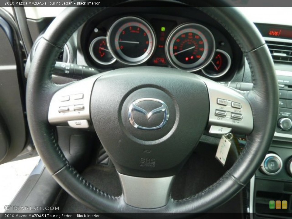 Black Interior Steering Wheel for the 2010 Mazda MAZDA6 i Touring Sedan #66111252