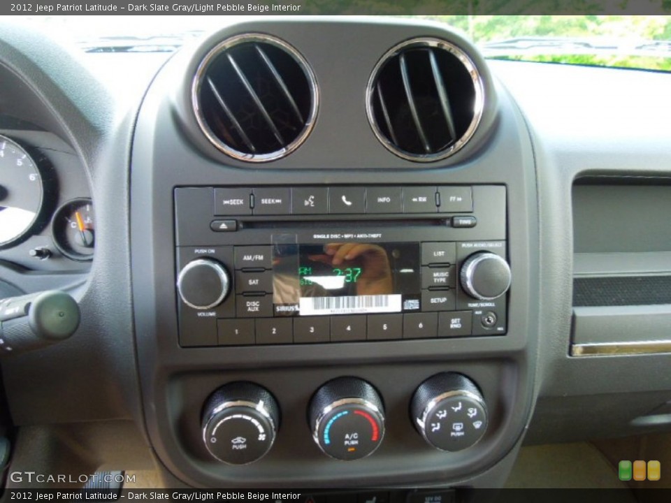 Dark Slate Gray/Light Pebble Beige Interior Controls for the 2012 Jeep Patriot Latitude #66118266