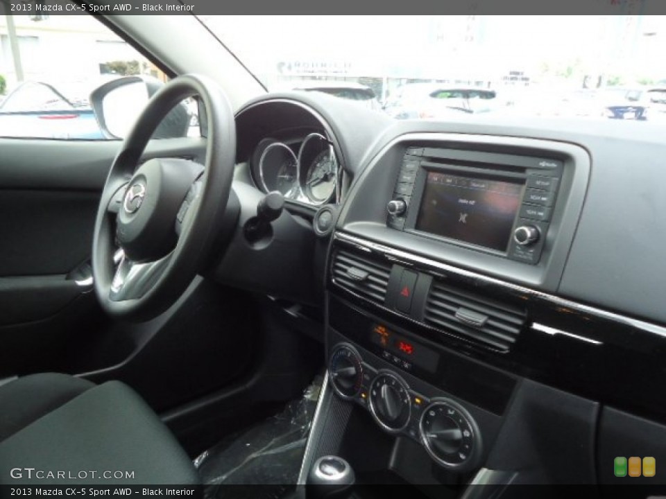 Black Interior Dashboard for the 2013 Mazda CX-5 Sport AWD #66132866