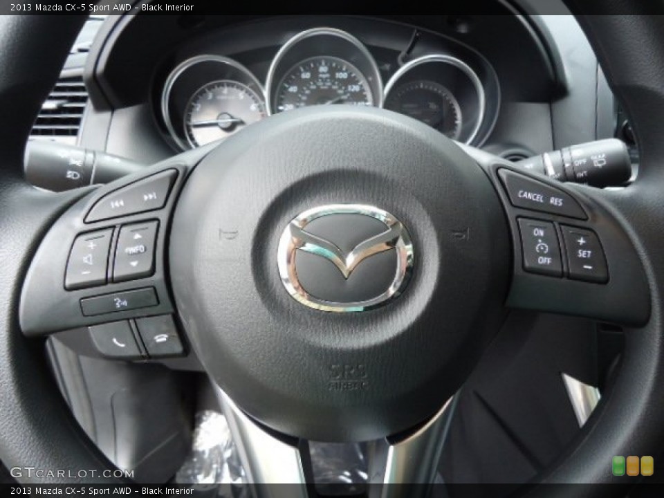 Black Interior Steering Wheel for the 2013 Mazda CX-5 Sport AWD #66132893