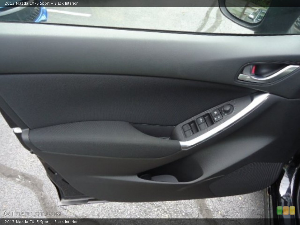 Black Interior Door Panel for the 2013 Mazda CX-5 Sport #66133037