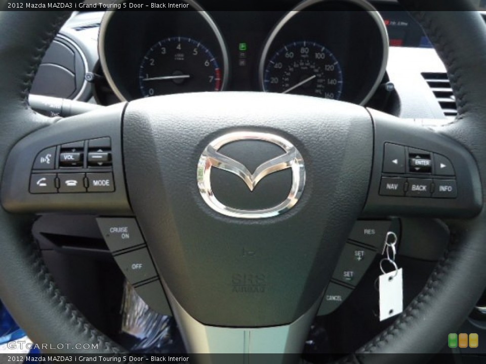 Black Interior Steering Wheel for the 2012 Mazda MAZDA3 i Grand Touring 5 Door #66133974