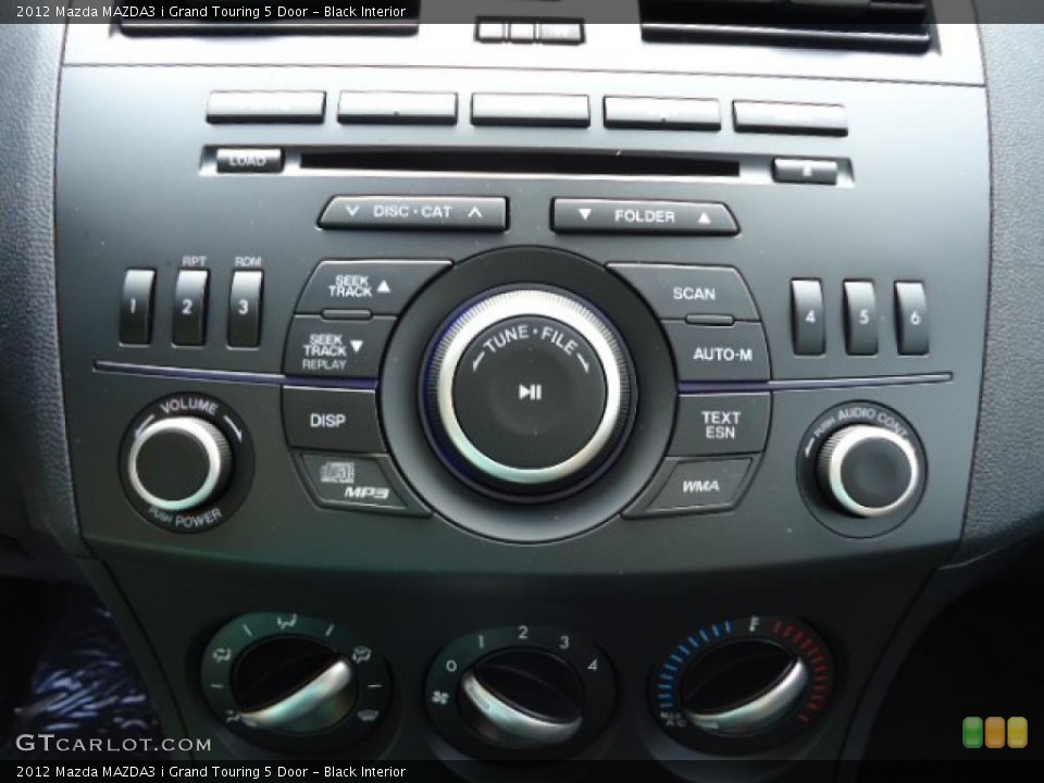 Black Interior Controls for the 2012 Mazda MAZDA3 i Grand Touring 5 Door #66133985